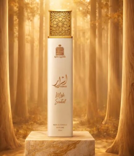 Asrar Misk Santal alcohol free perfume bottle with elegant Arabic-inspired design displayed with sandalwood, vanilla, honey, and spice ingredients.